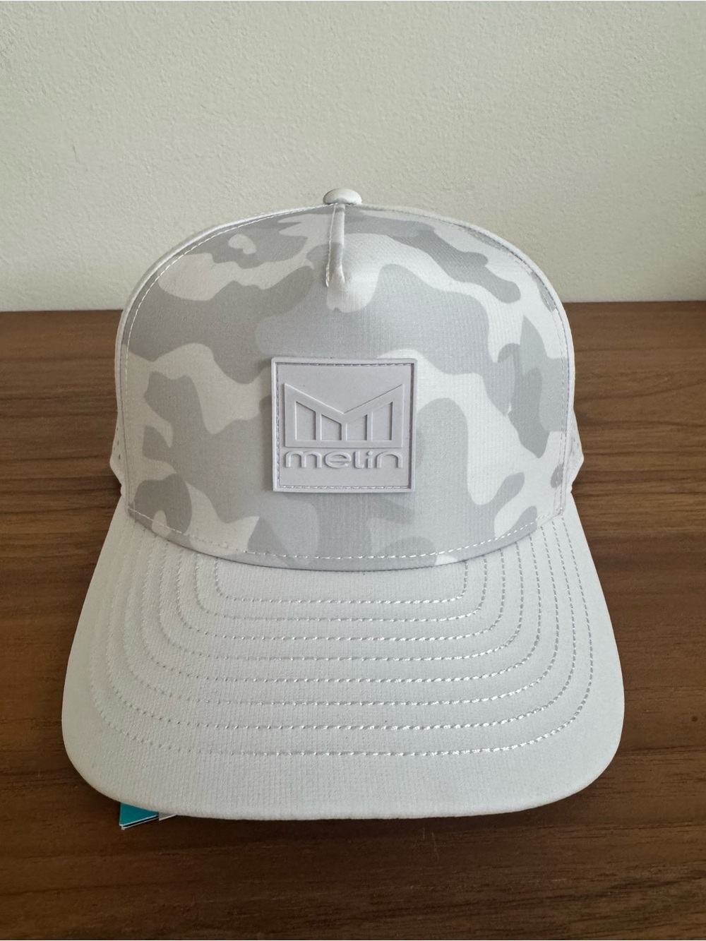 Melin Odysea stacked hydro Camo hat.